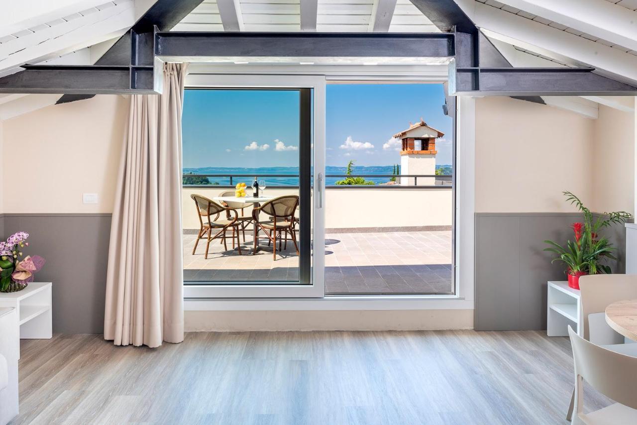 Residenza Panorama Aparthotel Костермано Екстериор снимка