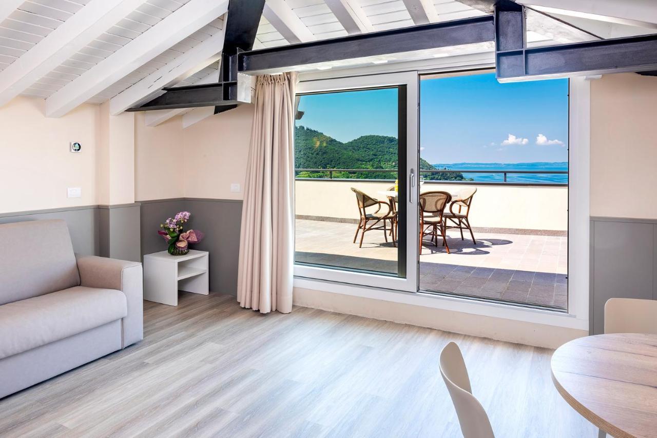 Residenza Panorama Aparthotel Костермано Екстериор снимка