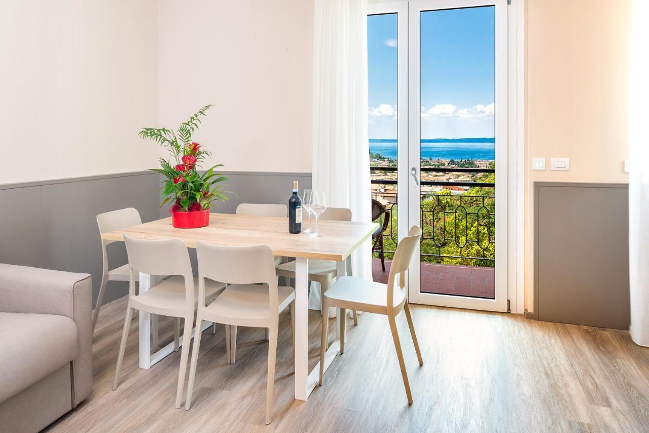 Residenza Panorama Aparthotel Костермано Екстериор снимка