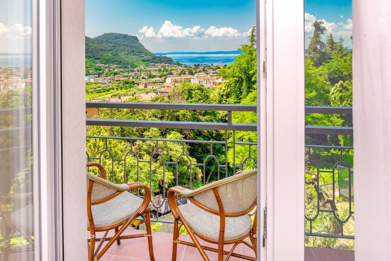 Residenza Panorama Aparthotel Костермано Екстериор снимка