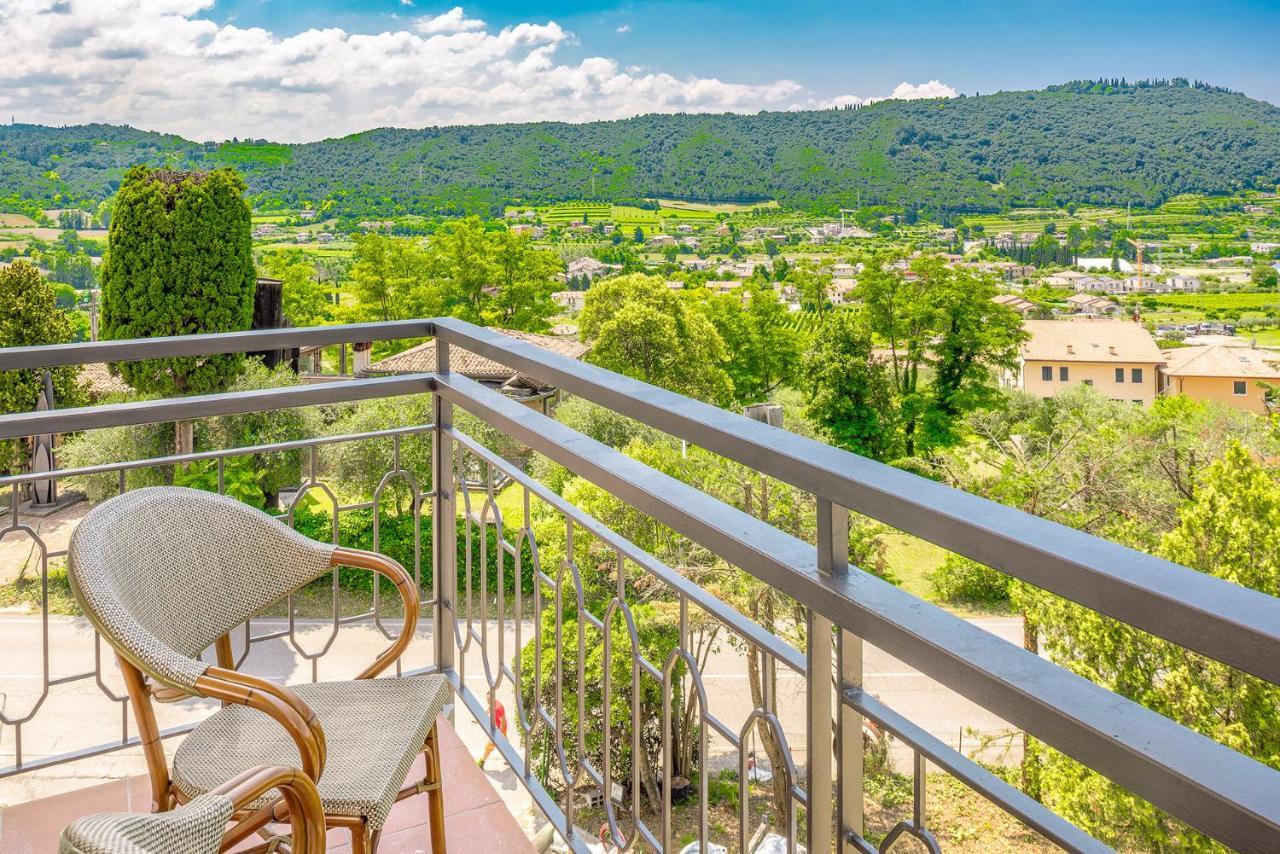 Residenza Panorama Aparthotel Костермано Екстериор снимка