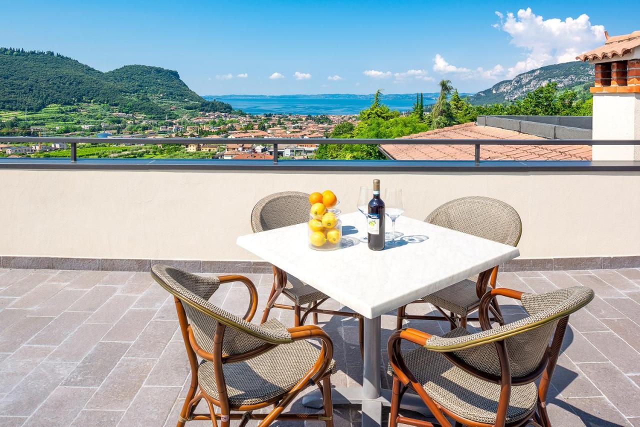Residenza Panorama Aparthotel Костермано Екстериор снимка